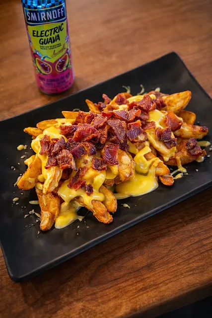 Papas Gajo con tocino y queso derretido