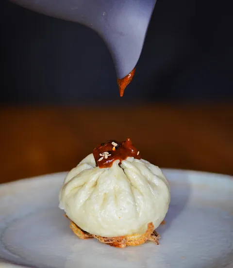 Dumpling de camarón y mole